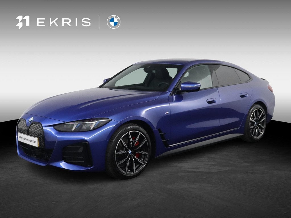BMW i4 eDrive35 M Sport Edition 70 kWh | SOH 100% | M Sport, Auto's, BMW, Gebruikt, Zwart, Met garantie (alle), Blauw