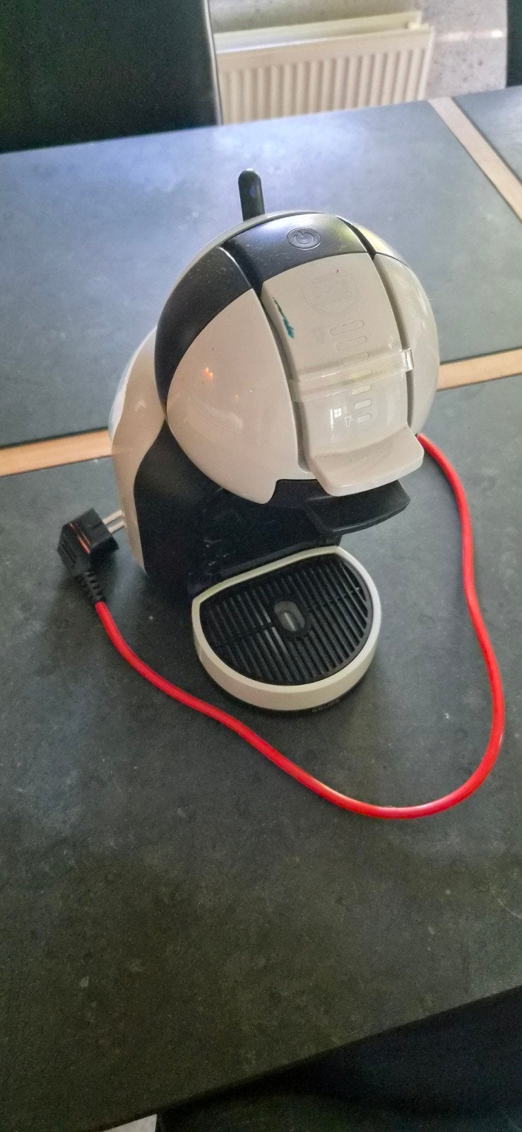 Dolce Gusto koffiezetapparaat, lekt, Ophalen