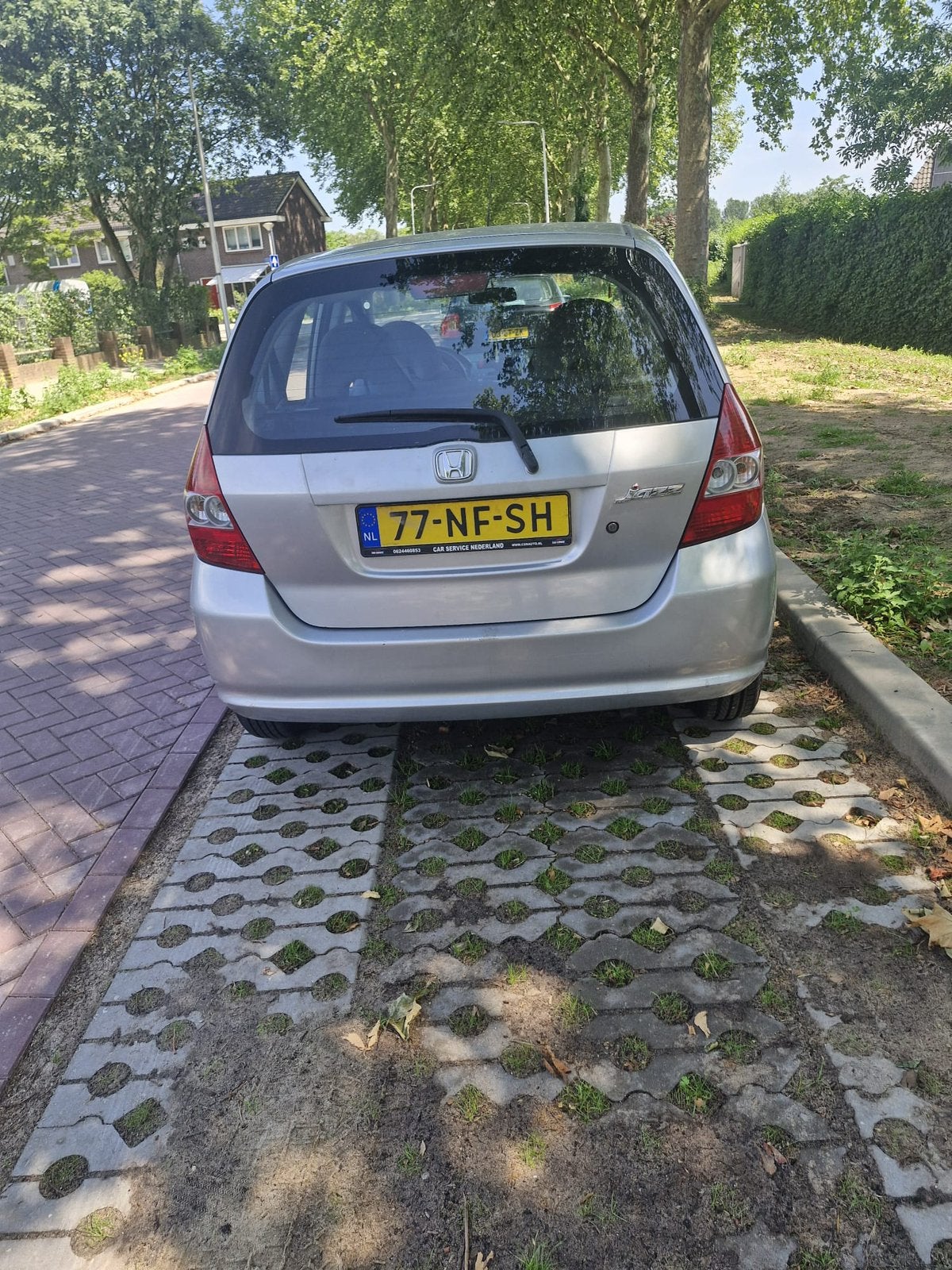 Honda Jazz 1.2 I 2003 Grijs, Auto's, Voorwielaandrijving, 450 kg, 40 €/maand, 4 cilinders