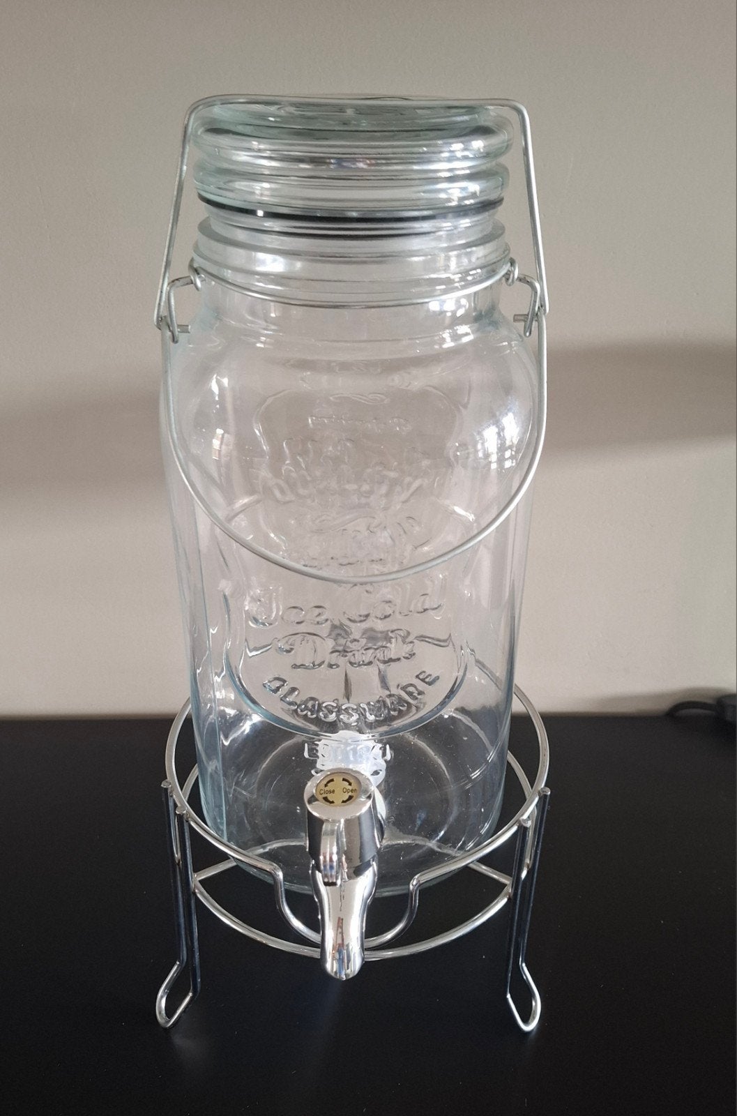 Limonade dispenser met 2 houders, Ophalen