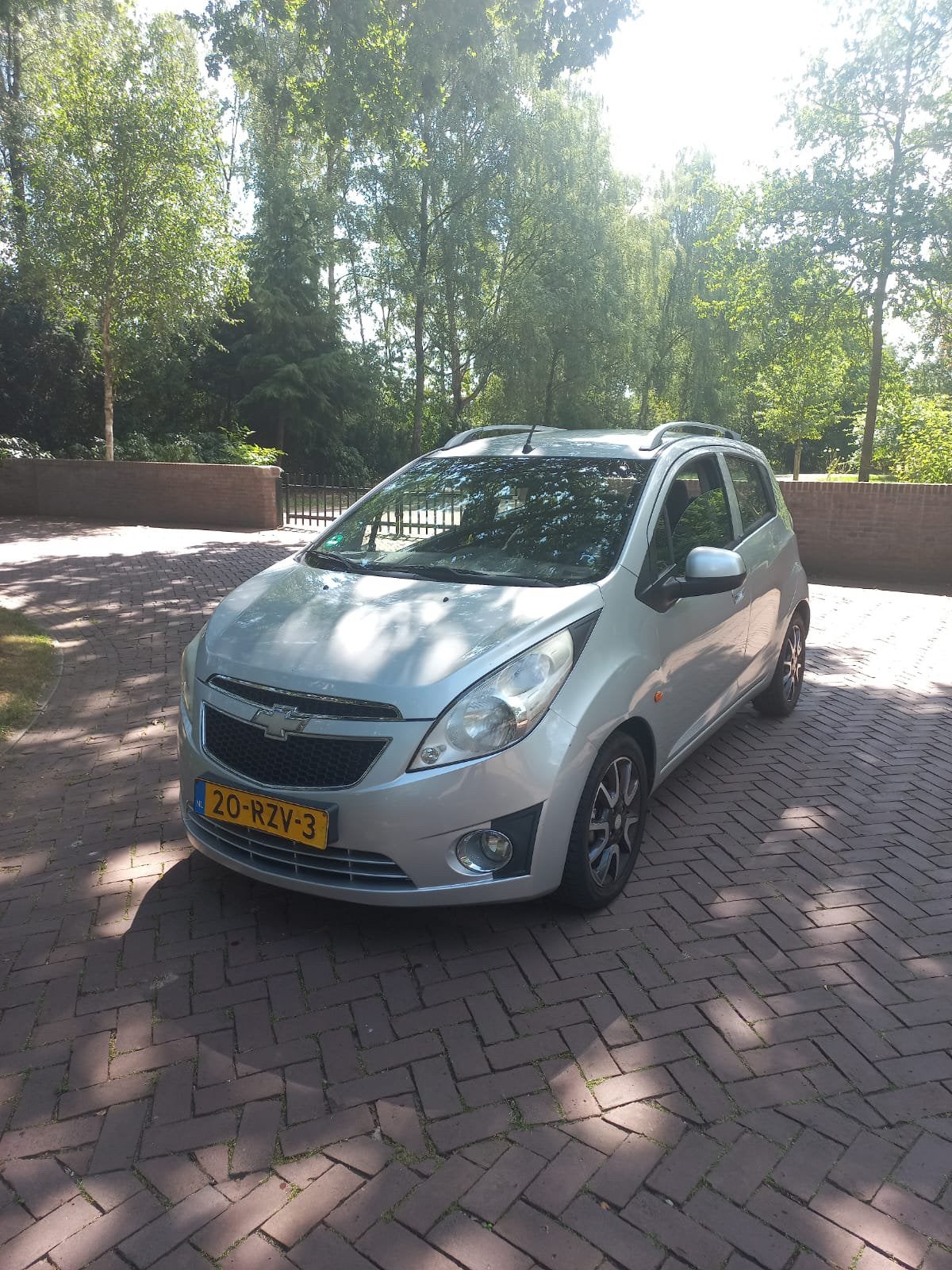 Chevrolet Spark 1.0 Bifuel 2011 Grijs airco, Auto's, 15 km/l, 37 €/maand, 4 cilinders, Origineel Nederlands