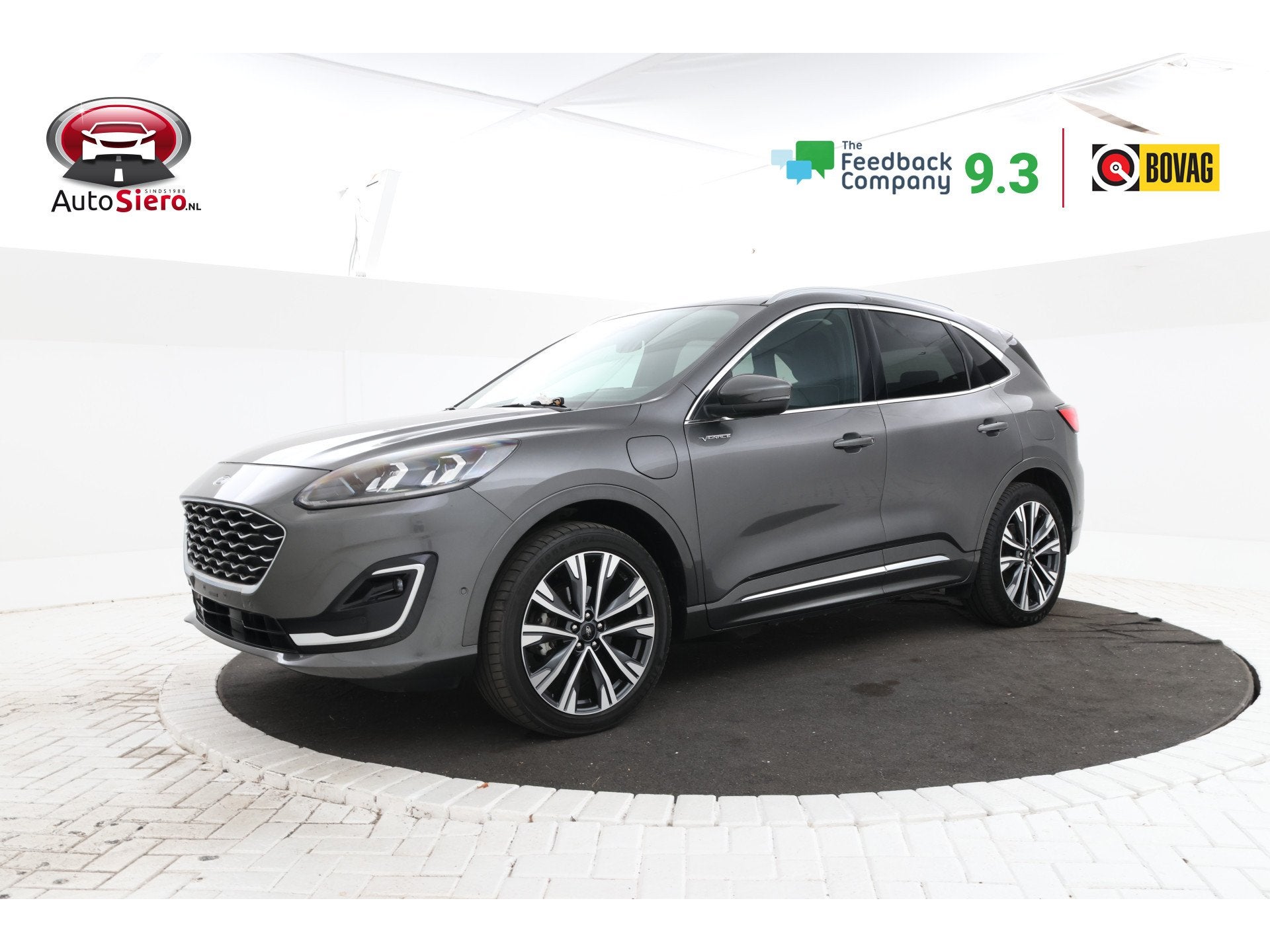 Ford Kuga 2.5 PHEV Vignale Trekhaak, Head up display! B&O, Auto's, Gebruikt, 4 cilinders, Met garantie (alle), Lichtsensor