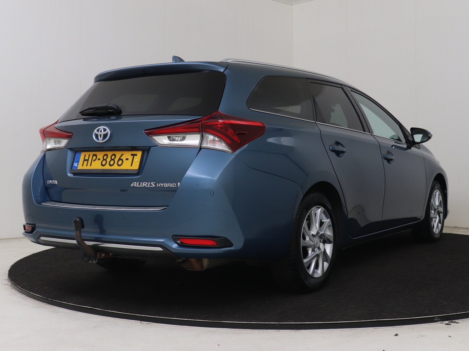 Toyota Auris Touring Sports 1.8 Hybrid Executive | Dealer on, Gebruikt, Blauw, Leder en Stof, Origineel Nederlands