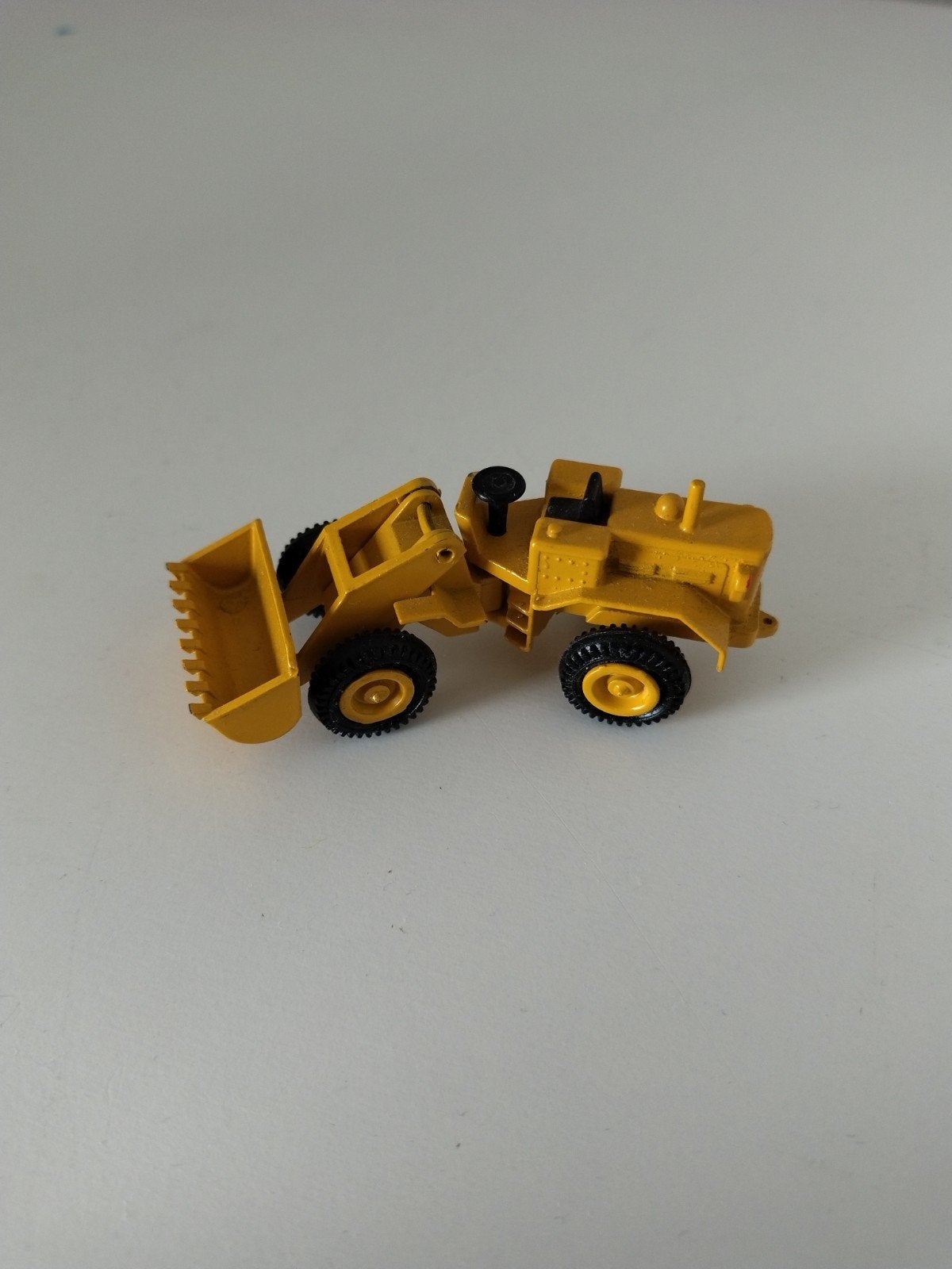 NZG 1:87 Shovel Caterpillar - Geel Diecast Model, Ophalen of Verzenden, Gebruikt, Hijskraan, Tractor of Landbouw, Overige merken