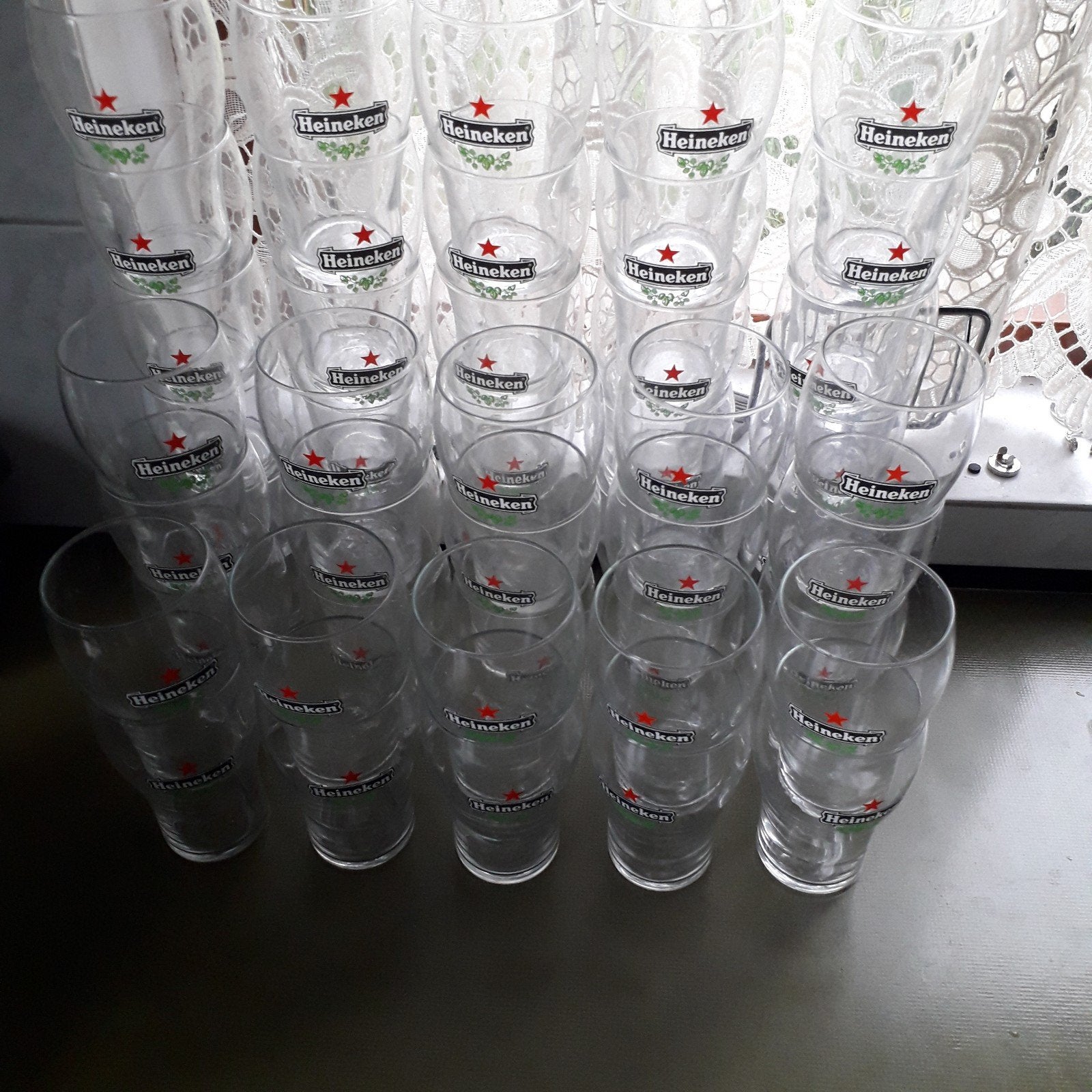 48 Heineken bierglazen - Perfect voor feestjes!, Verzamelen, Biermerken, Ophalen, Gebruikt