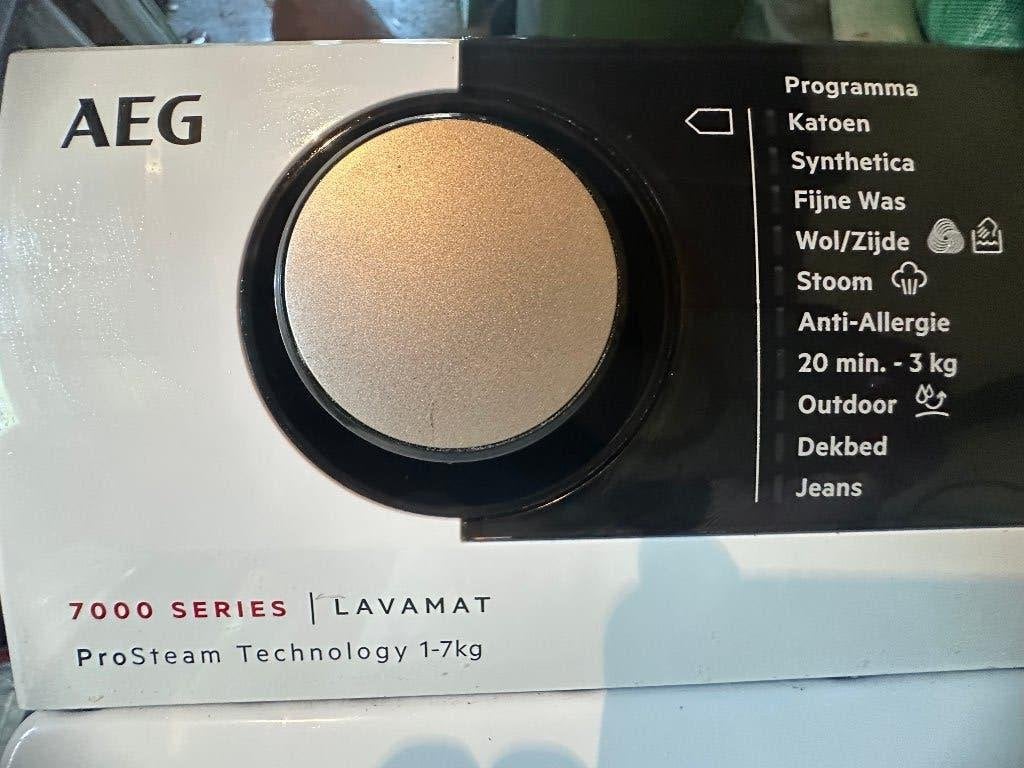 Te koop: mooie AEG ProSteam L7TB73E Bovenlader Wasmachine, Ophalen, Bovenlader, Zo goed als nieuw, 85 tot 90 cm