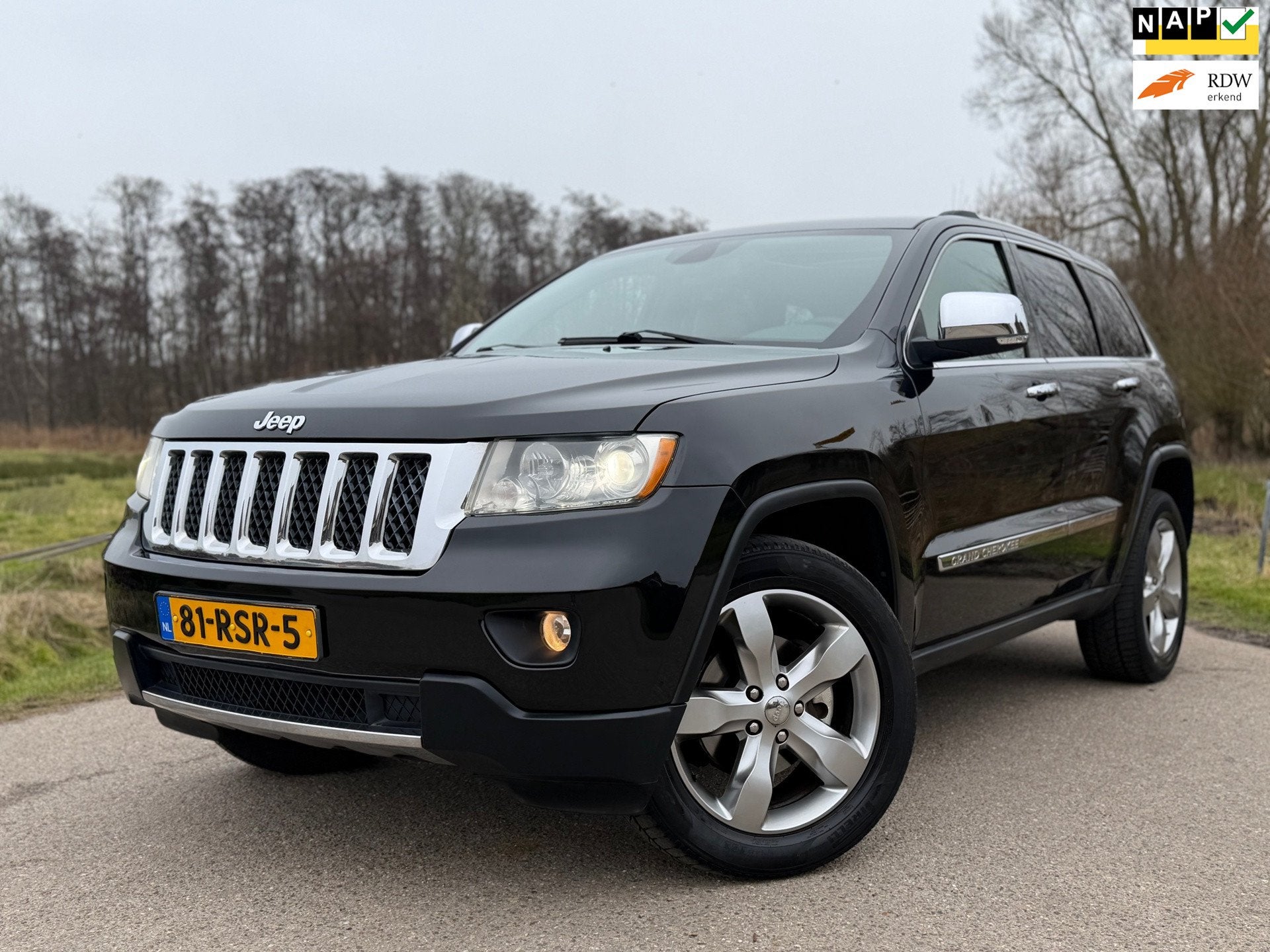 Jeep Grand Cherokee 3.6 Overland Automaat / Youngtimer / Pan, Auto's, Jeep, Automaat, Euro 5, Zwart, Stoelverwarming
