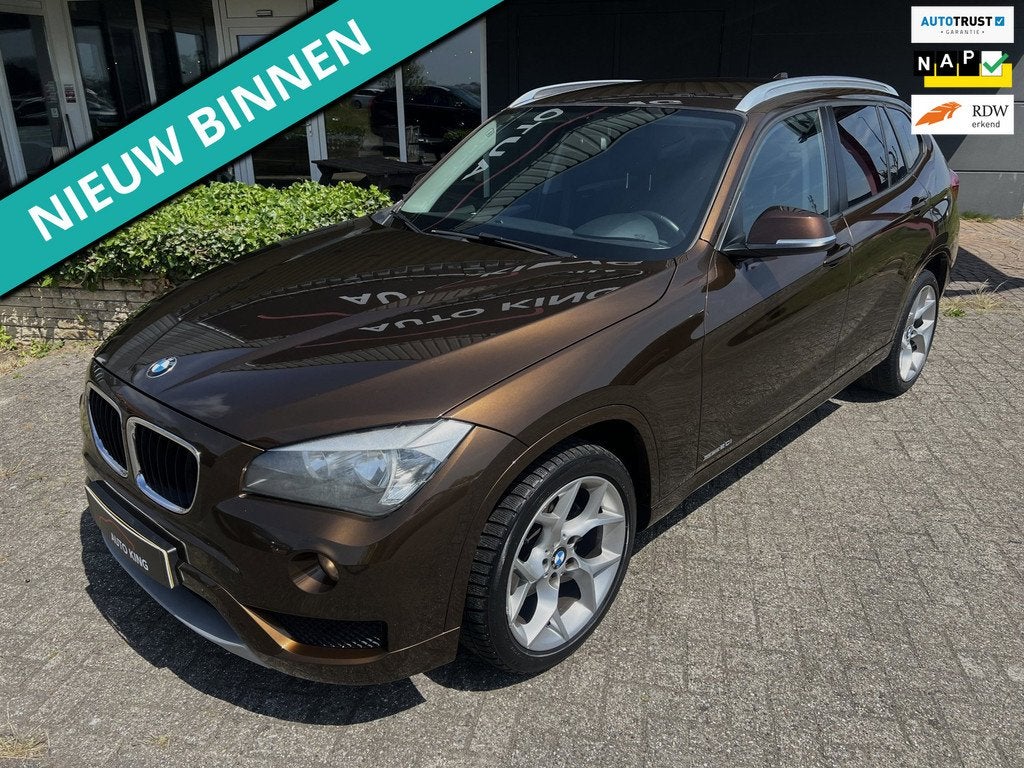 BMW X1 SDrive20i Executive ECC/NAV/XENON/PDC APK+NAP, 4 cilinders, Bruin, Origineel Nederlands, 184 pk