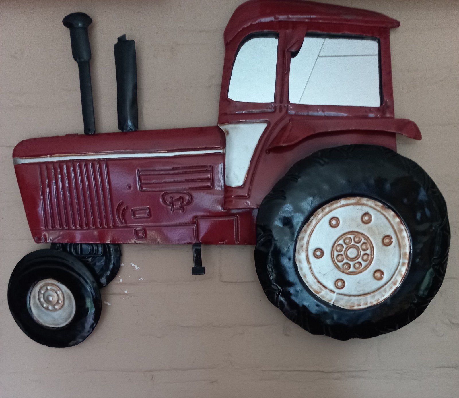 Metalen tractor, Ophalen