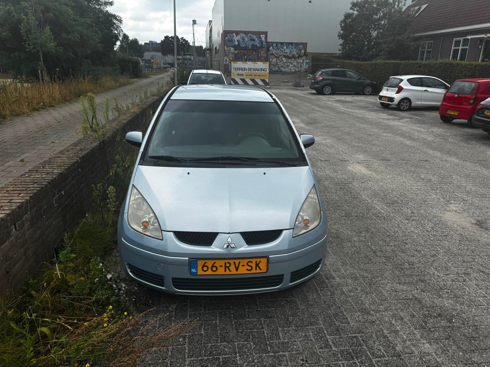 Mitsubishi Colt 1.3 CZ5 2005 Blauw, Auto's, Stof, 31 €/maand, Blauw, Colt