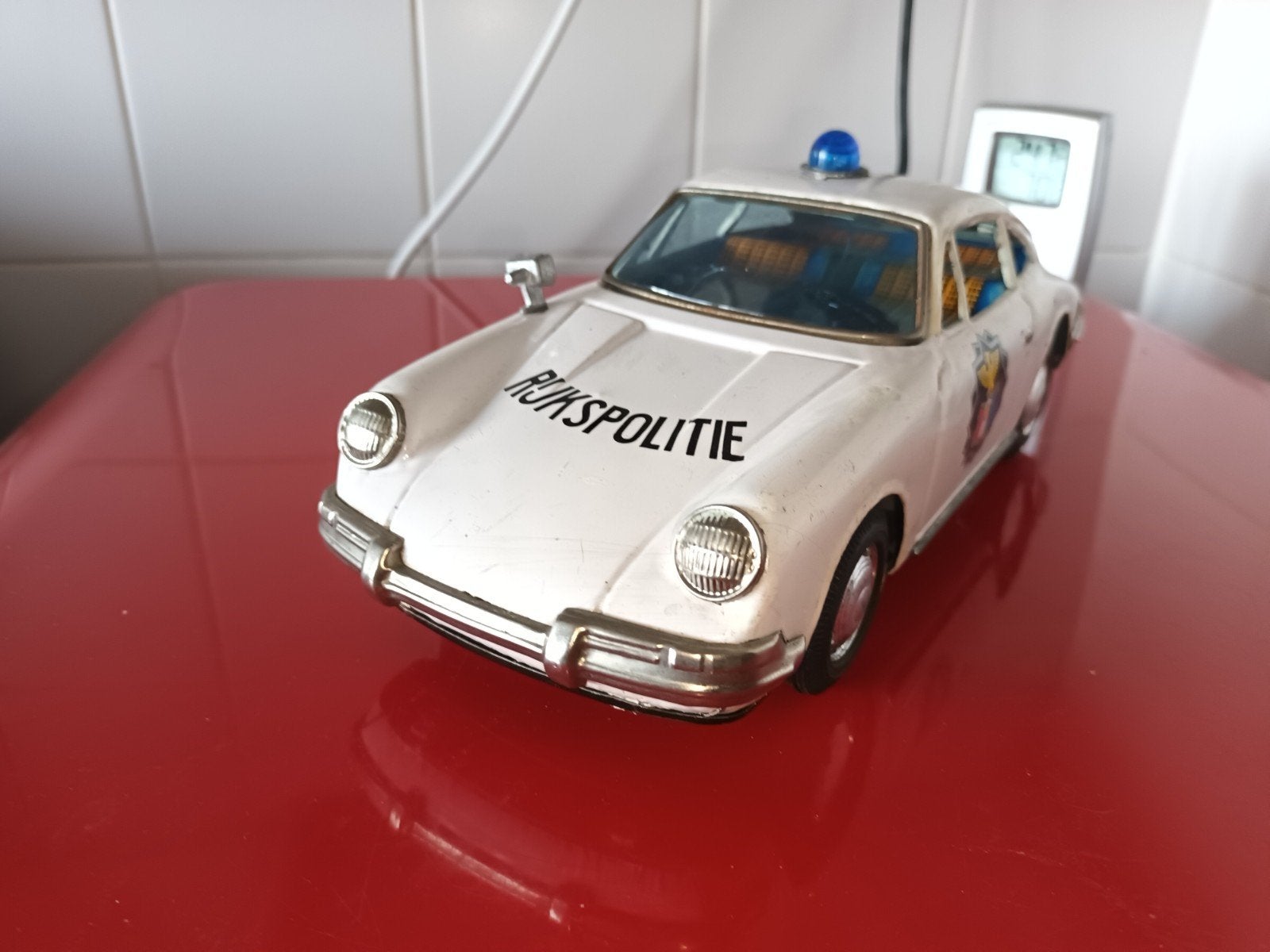 Blikken speelgoed. Porsche 911. Rijkspolitie. Bandai japan., Antiek en Kunst, Antiek | Speelgoed, Ophalen of Verzenden