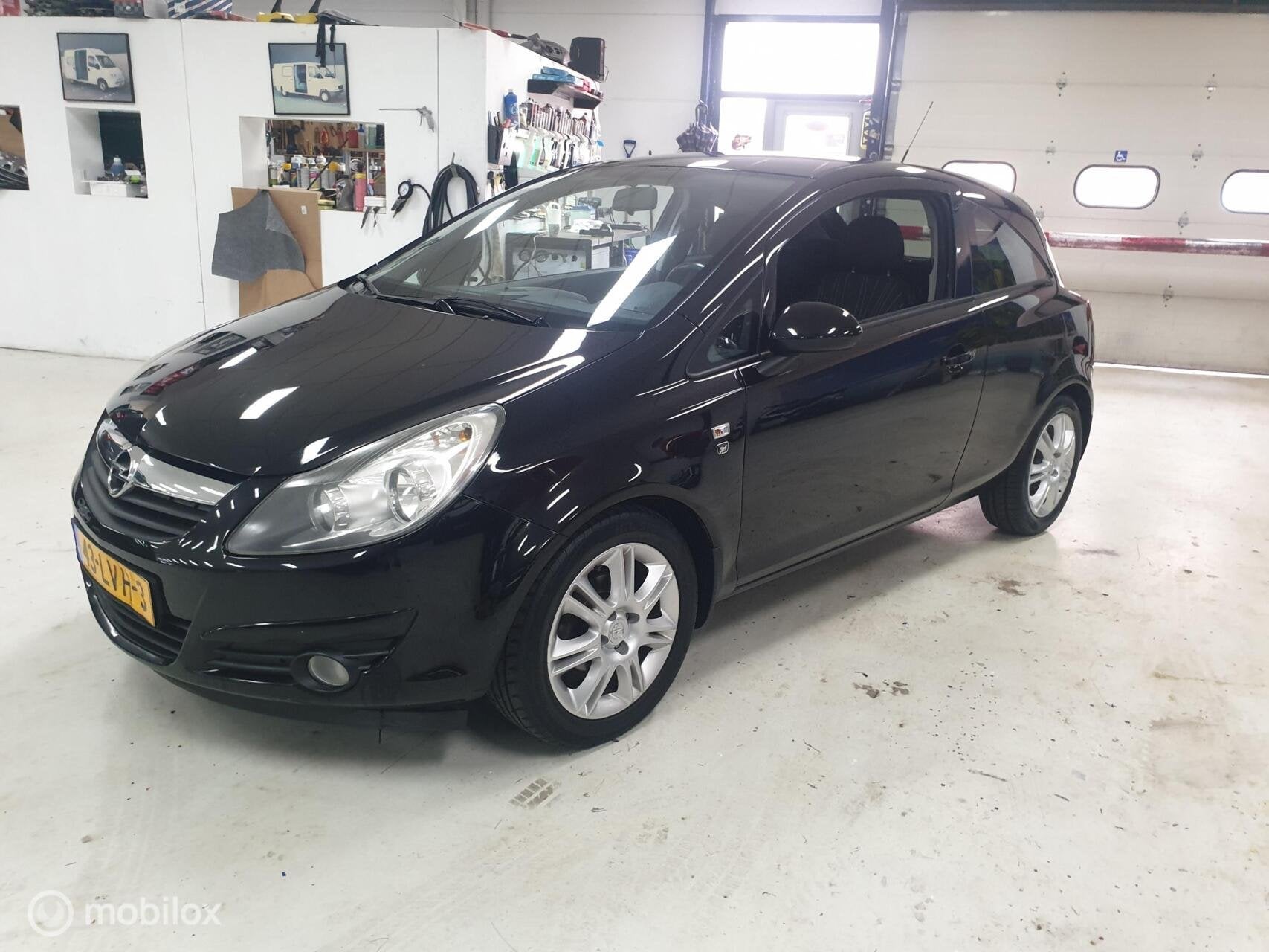 Opel Corsa 1.2-16V Cosmo 2010 Airco! 86 PK, Auto's, Voorwielaandrijving, Euro 5, 1229 cc, Zwart