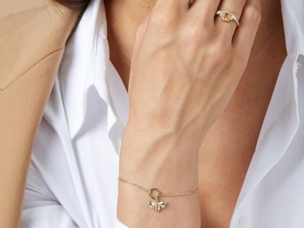 Diamond Point Queen Bee armband, Sieraden, Tassen en Uiterlijk, Nieuw, Ophalen of Verzenden, Met bedels of kralen, Goud