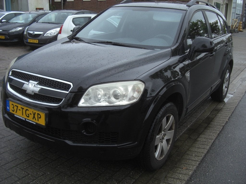 Chevrolet Captiva apk 9.27 airco 2.4i Style 2WD 7 plts, Auto's, 1660 kg, Parkeersensor, 136 pk, Gebruikt