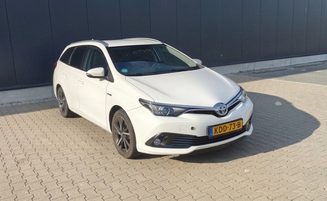 Toyota Auris 1.8 Hybrid 136pk Aut 2017 Wit, Auto's, Zwart, Alcantara, Wit, Bluetooth