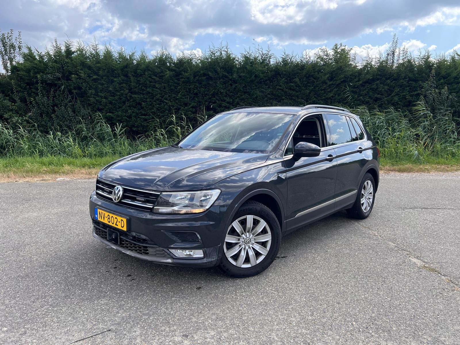 Volkswagen Tiguan 2.0 TDI Comfortline AUTOMAAT SPORT PDC, Auto's, Volkswagen, Gebruikt, Euro 6, 4 cilinders, Origineel Nederlands