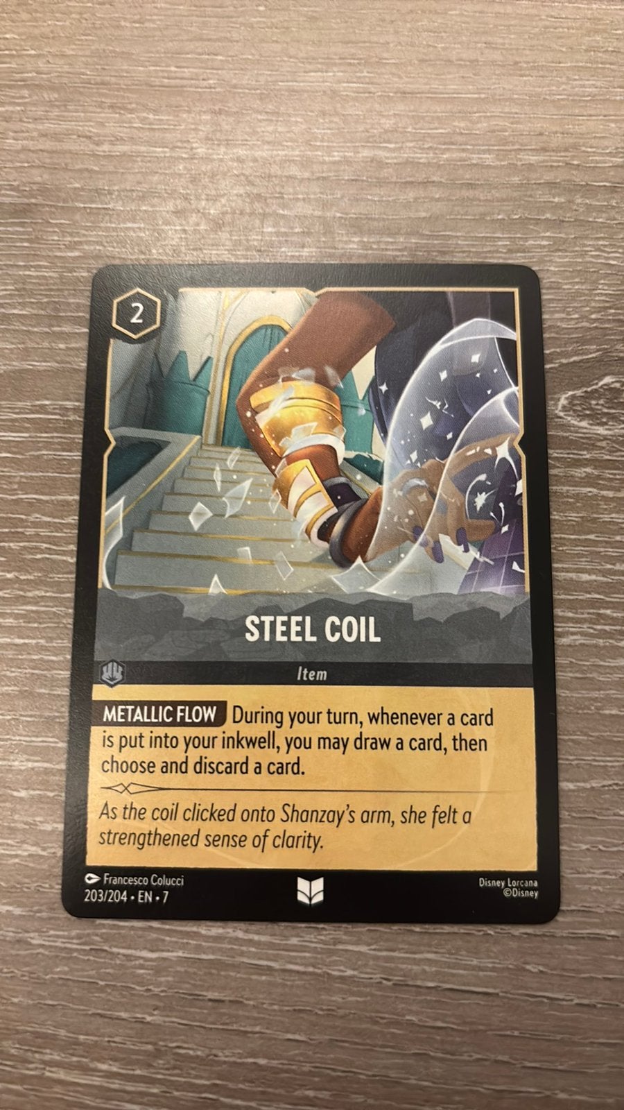 Disney Lorcana Steel Coil 203-204 7ARI nonfoil, Hobby en Vrije tijd, Ophalen of Verzenden, Zo goed als nieuw