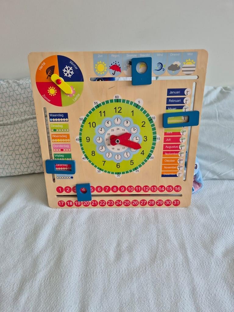Houten leerklok met kalender en weer, Ophalen