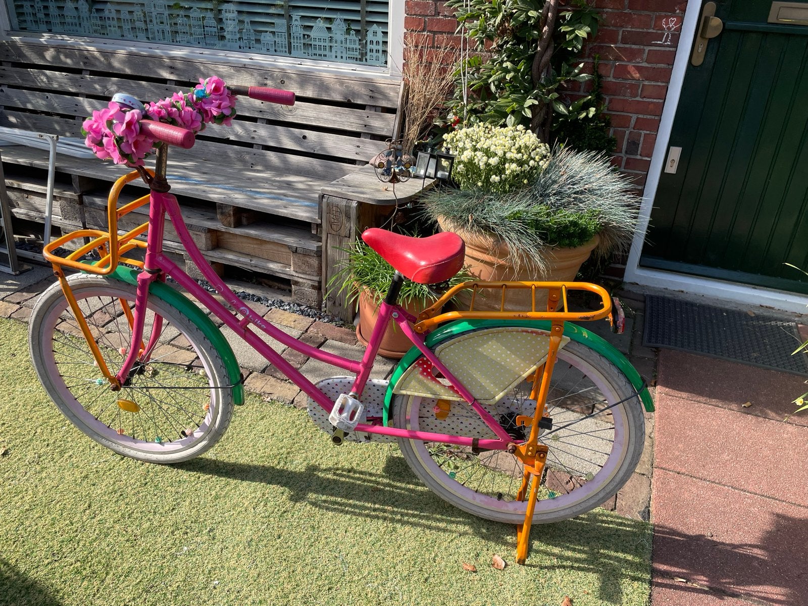 Roze kinderfiets met bloemen en voorrek, Fietsen en Brommers, Ophalen, Gebruikt, Terugtraprem, 24 inch