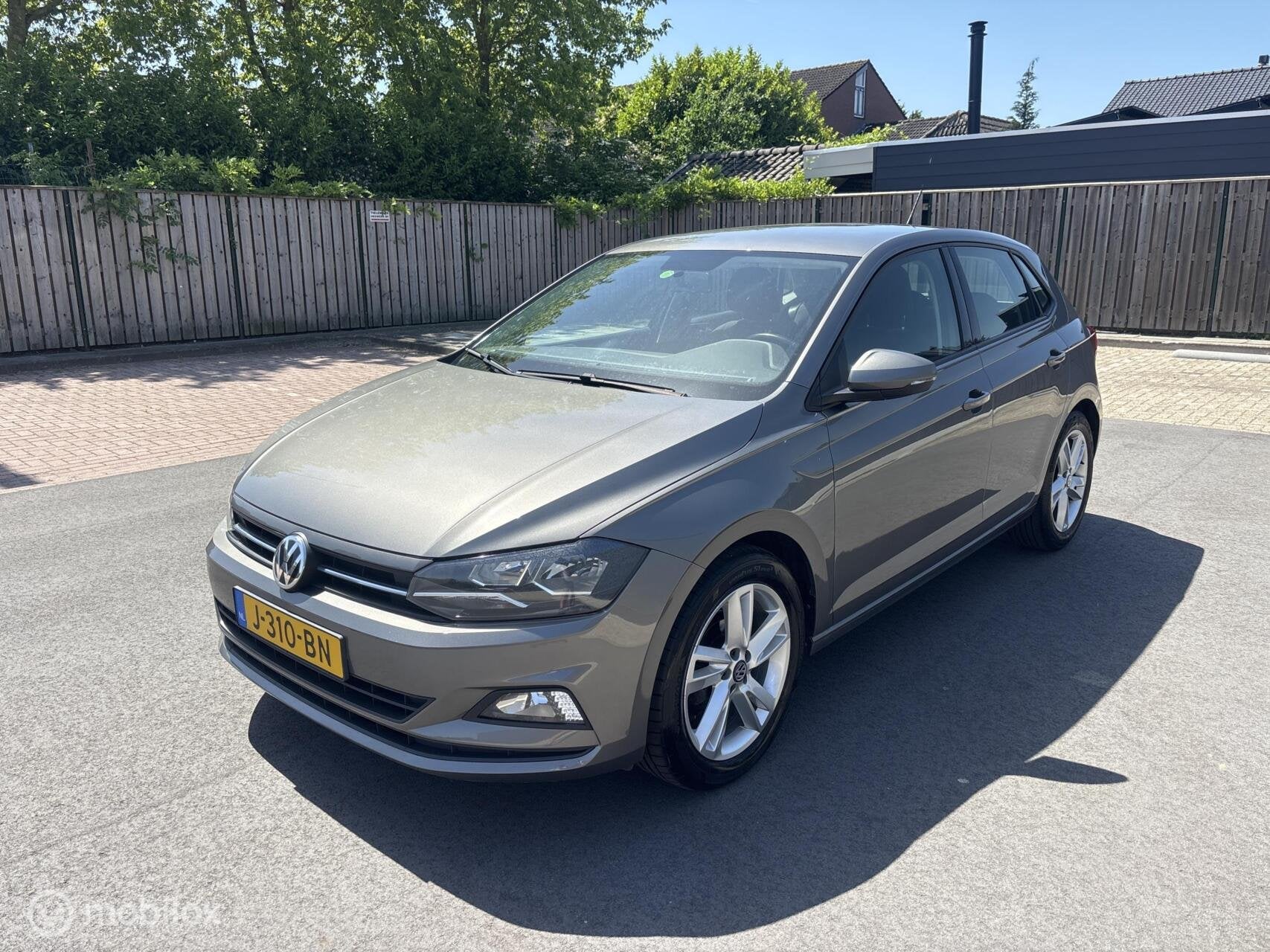 Volkswagen Polo 1.0 TSI Comfortline 2020 Ditigale teller, Auto's, Voorwielaandrijving, Gebruikt, Euro 6, 1055 kg