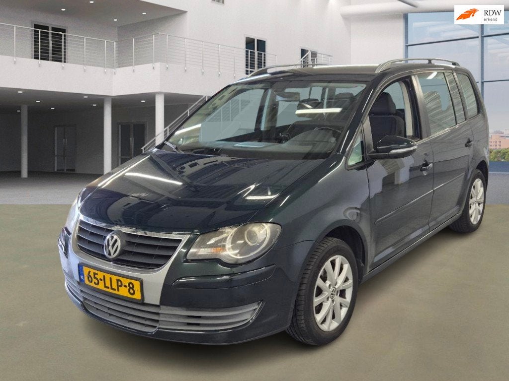 Volkswagen Touran 1.4 TSI Comfortline AUTOMAAT NAVI PSENSOR, Auto's, Gebruikt, 4 cilinders, Bedrijf, Grijs