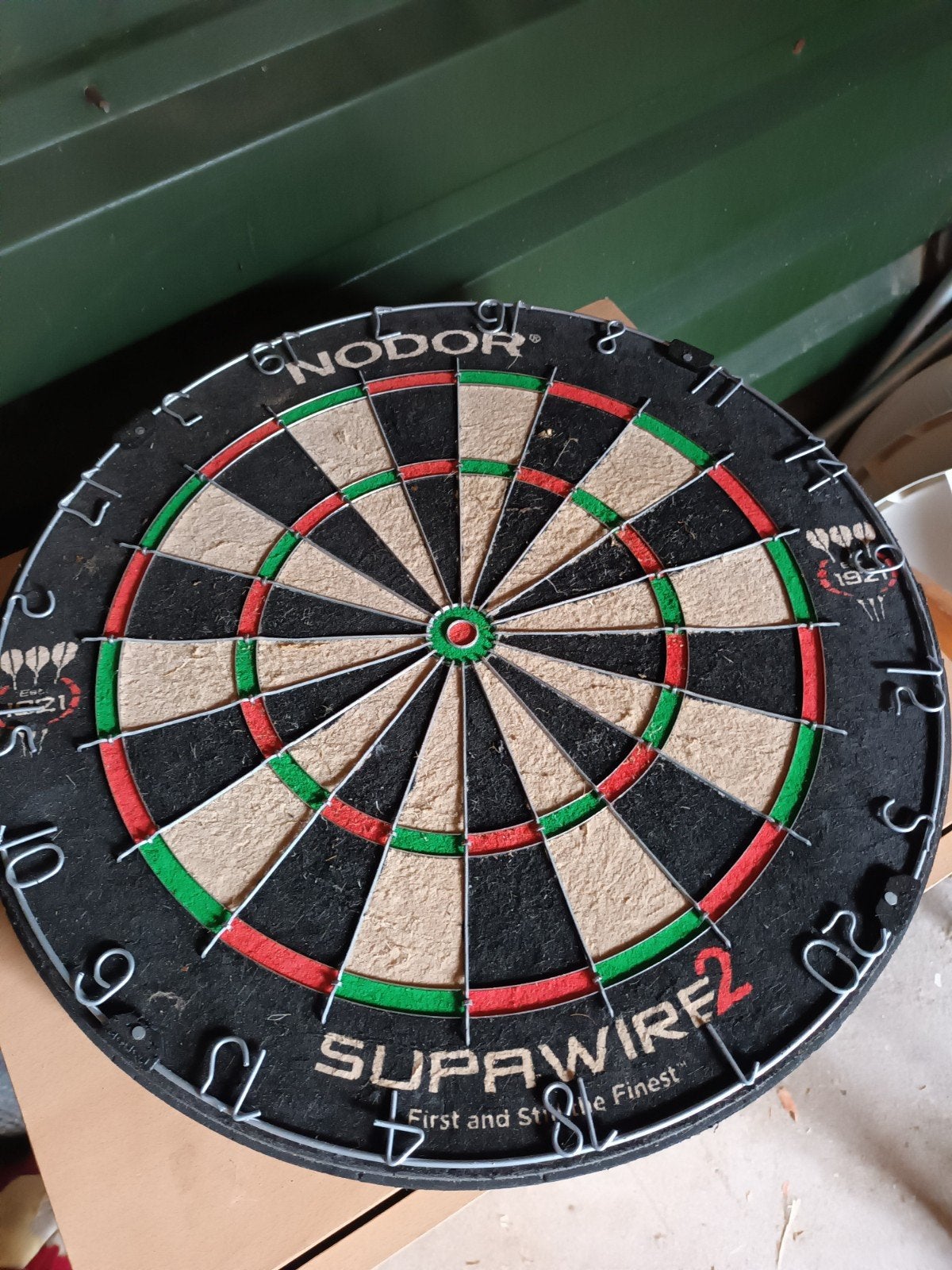 nodor dartbord, Ophalen, Dartbord