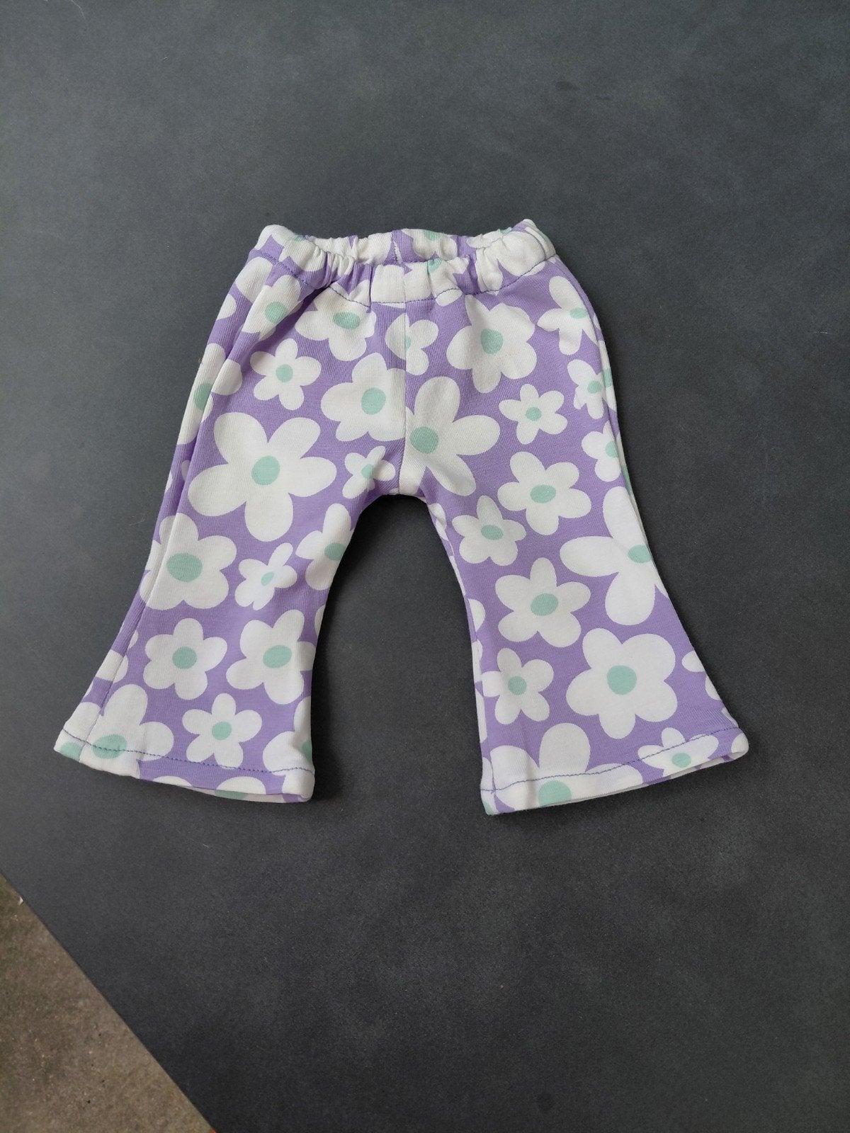 lila broekje met witte bloem voor baby born pop, Ophalen of Verzenden, Nieuw, Babypop