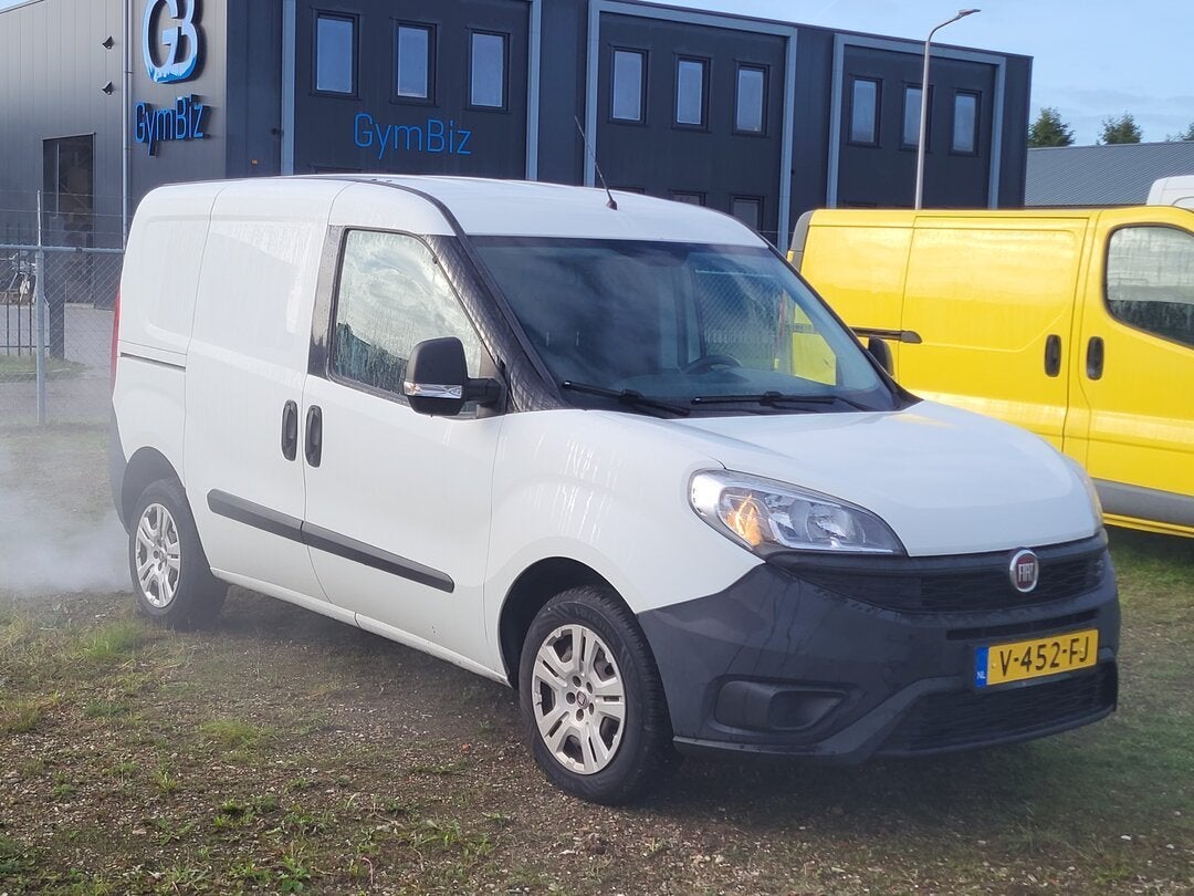 Fiat Doblo 1.3 MultiJet APK: 27-02-2027 95pk 2017, Auto's, Gebruikt, Euro 6, Wit, 1365 kg