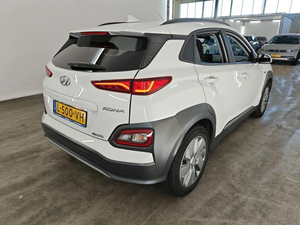 HYUNDAI KONA EV FASHION SKY 64 kWh (100% SOH) I 3-FASE LADEN, Stof, Gebruikt, Huisgarantie, Met garantie (alle)