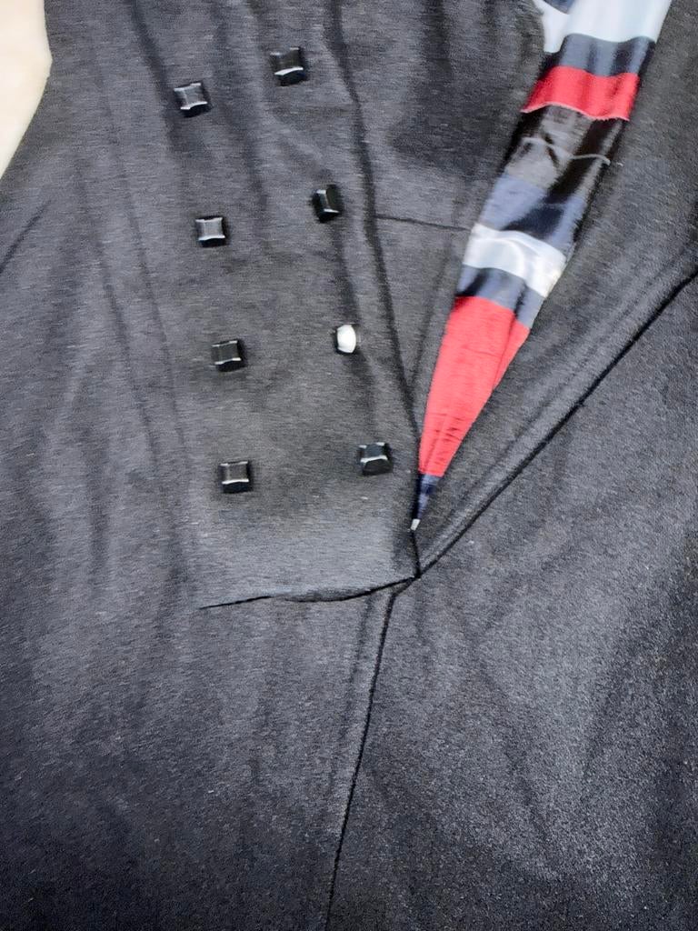 Nikkie zwarte lange jas met studs, Ophalen of Verzenden, Zo goed als nieuw, Maat 38/40 (M), Zwart