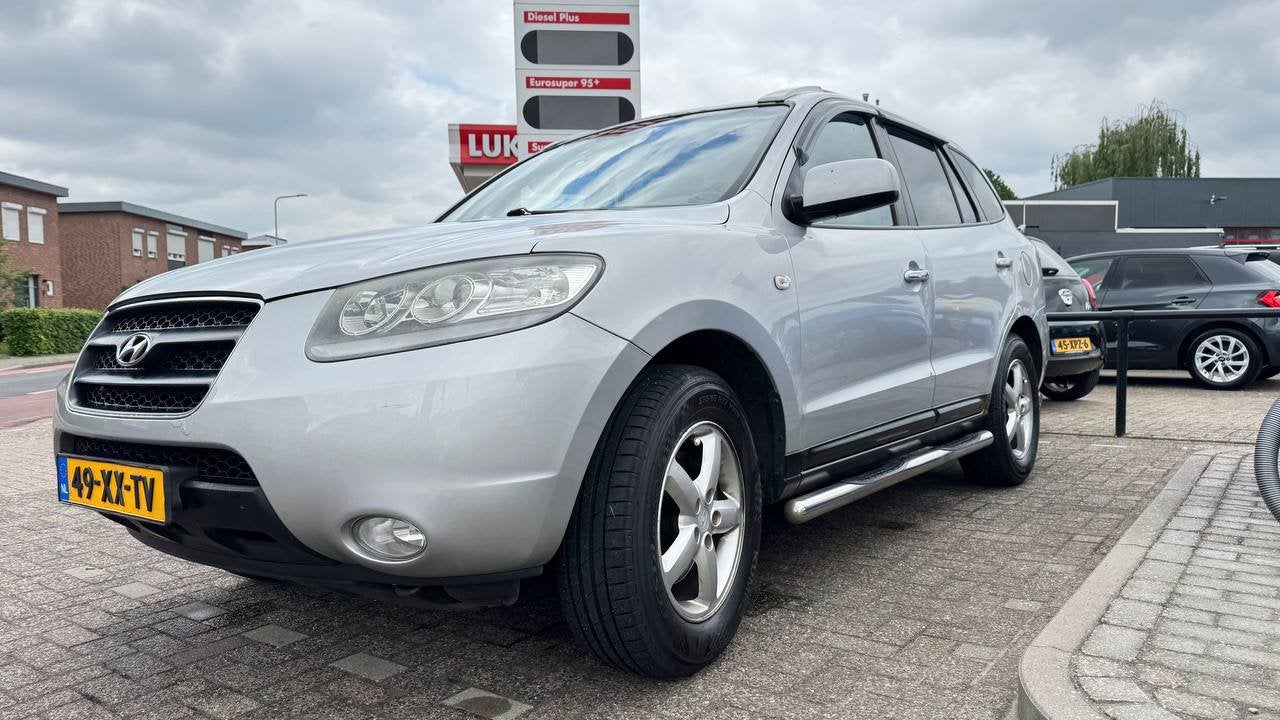 Hyundai Santa Fe 2.7 2WD 7-ST 2007 Grijs, Auto's, Hyundai, Voorwielaandrijving, Santa Fe, 2000 kg, Handgeschakeld