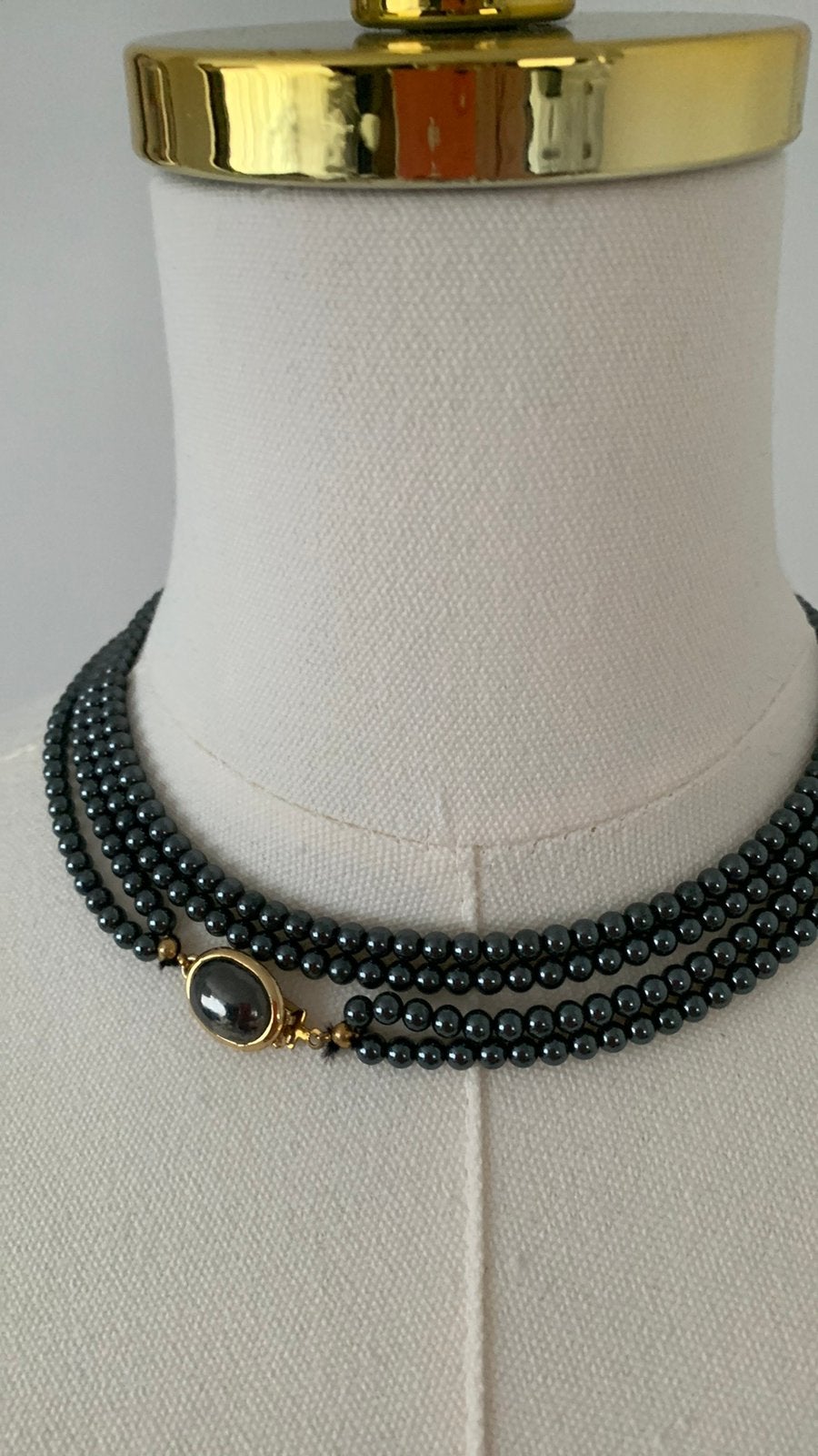 Lange hematiet ketting met goudkleurig slotje, Ophalen of Verzenden, Nieuw, Zwart, Steen of Mineraal