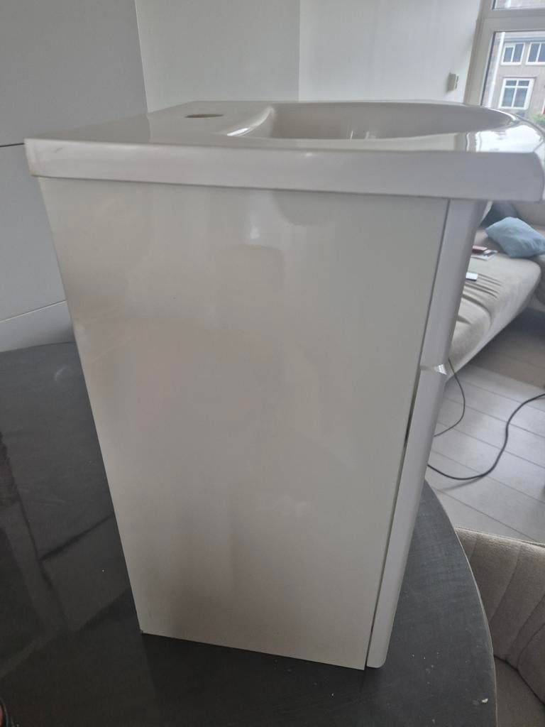 Wastafel met onderkast, Ophalen