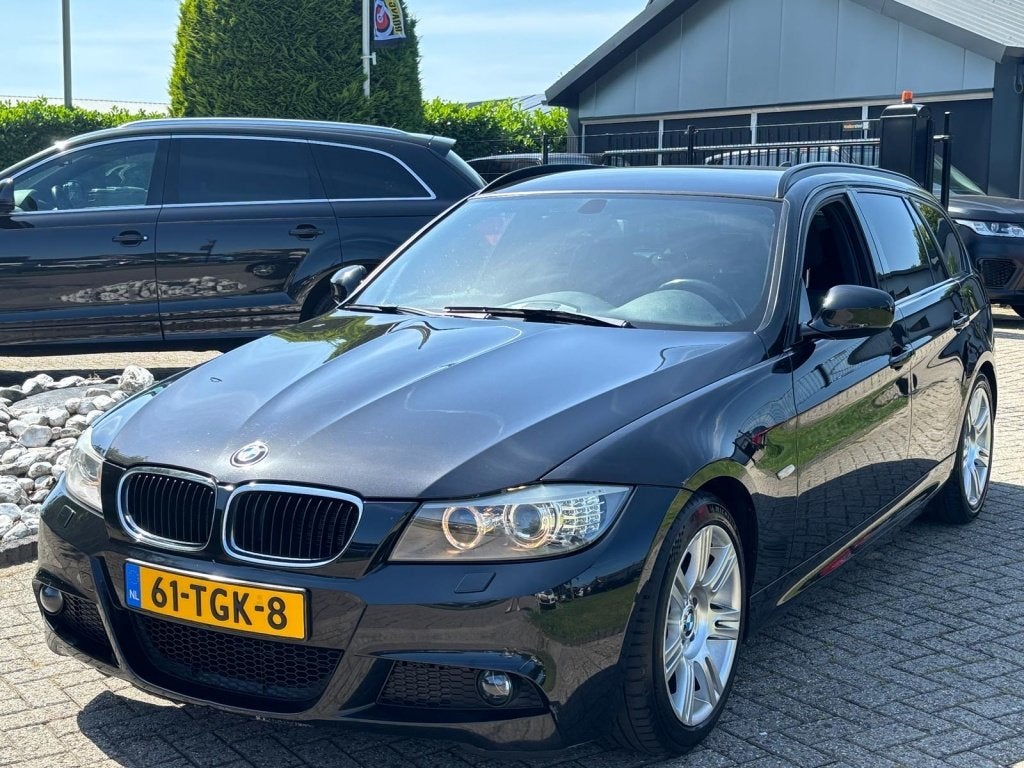 BMW 3 Serie Touring 320i Zwart M-Pakket 2012 Trekhaak, Auto's, Euro 5, 4 cilinders, Zwart, Origineel Nederlands