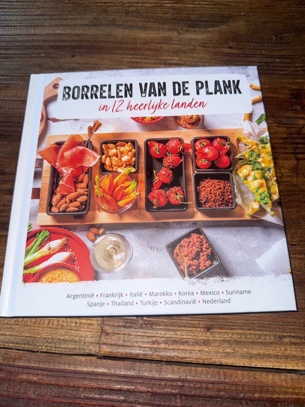 Borrelen van de Plank: 12 heerlijke landen, Ophalen of Verzenden, Zo goed als nieuw, Overige gebieden, Tapas, Hapjes en Dim Sum