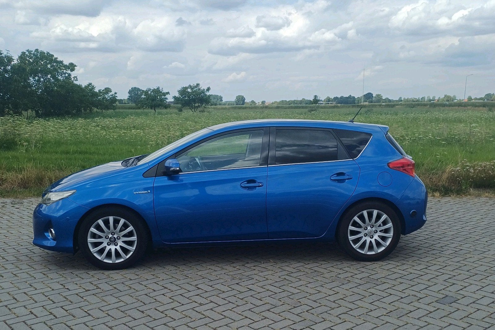 Toyota Auris 1.8 Hybrid 73KW 5D 2014 Blauw LPG-G3, Stof, Zwart, Blauw, Navigatiesysteem