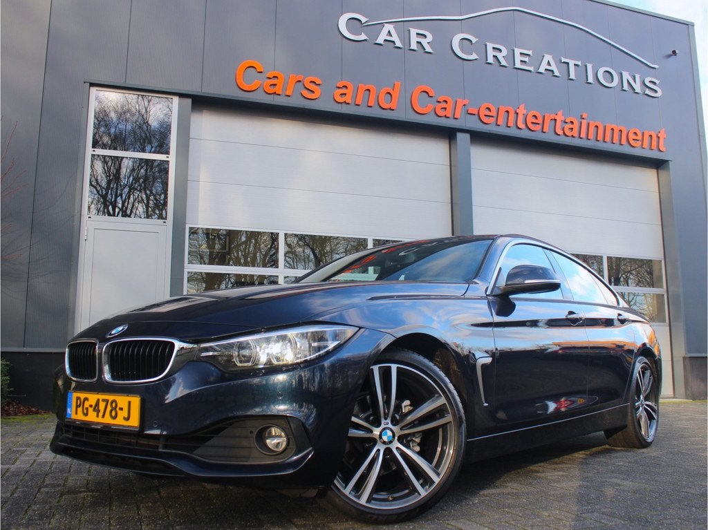 BMW 4 Serie Gran Coupé 418i High Executive NL-Auto 19 Inch, Auto's, Automaat, Gebruikt, Blauw, 19 km/l