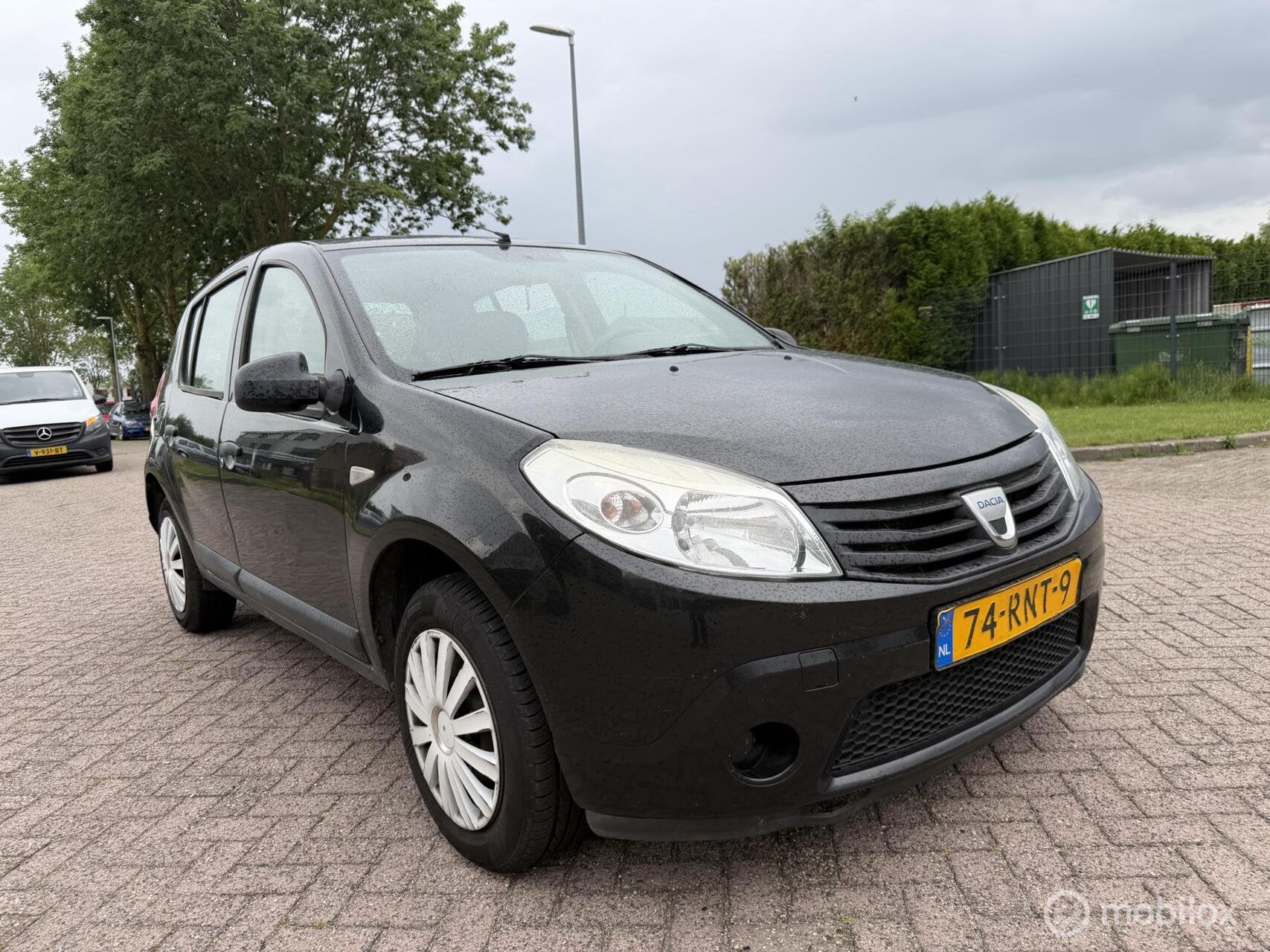 Dacia Sandero 1.2 Ambiance Export, Auto's, Euro 5, Gebruikt, 4 cilinders, Origineel Nederlands