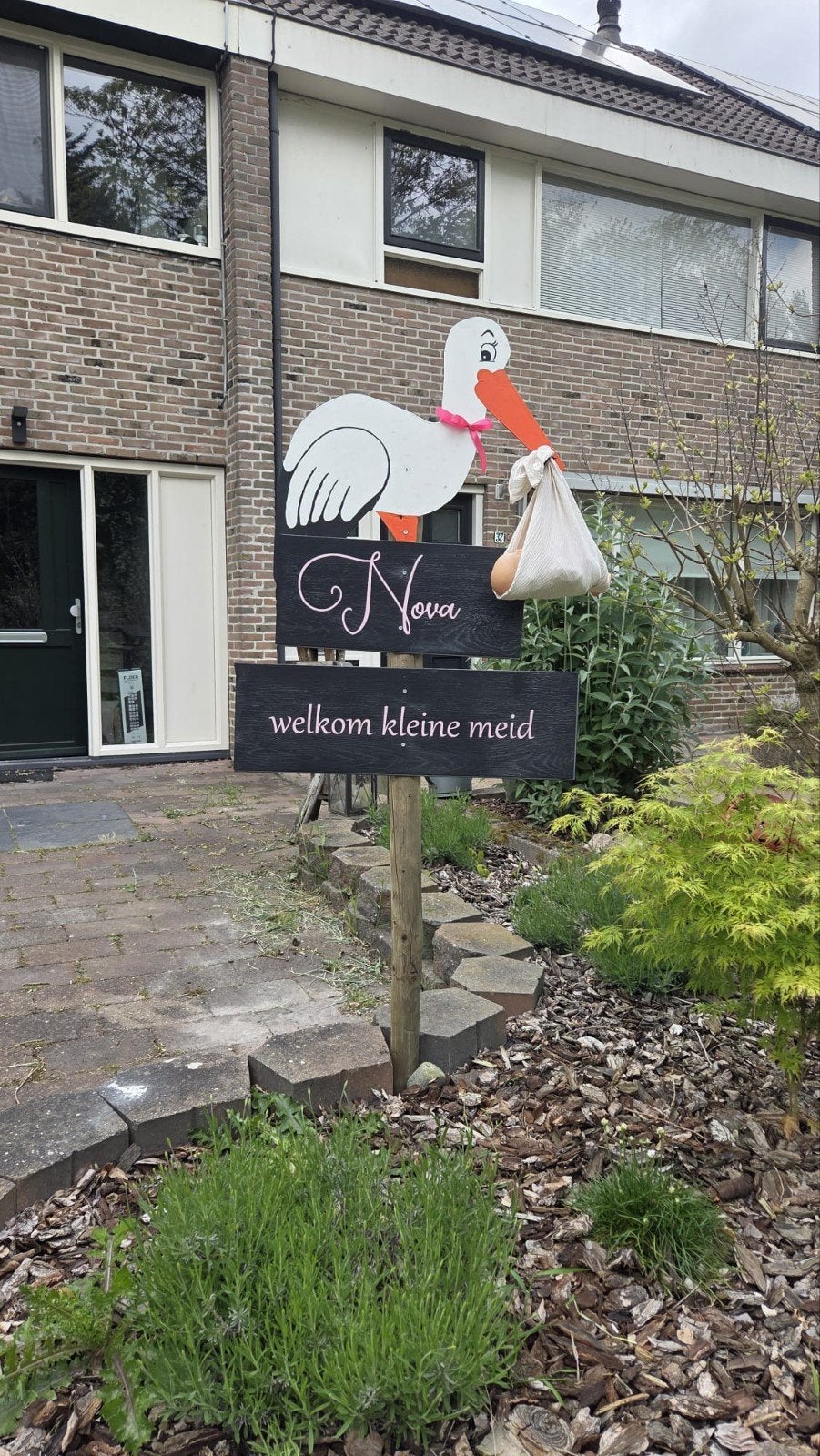 Geboortebord ooievaar met baby, Ophalen