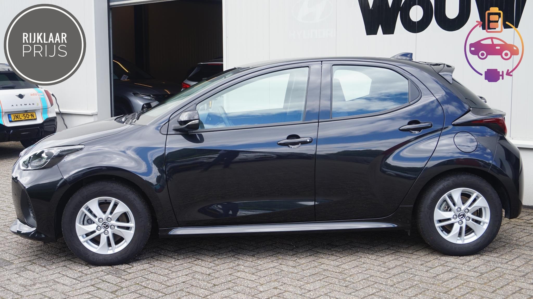 Mazda 2 Hybrid 1.5 Apple Carplay/Android Auto | Rijklaarprij, Auto's, Gebruikt, 4 kWh, Zwart, 1490 cc