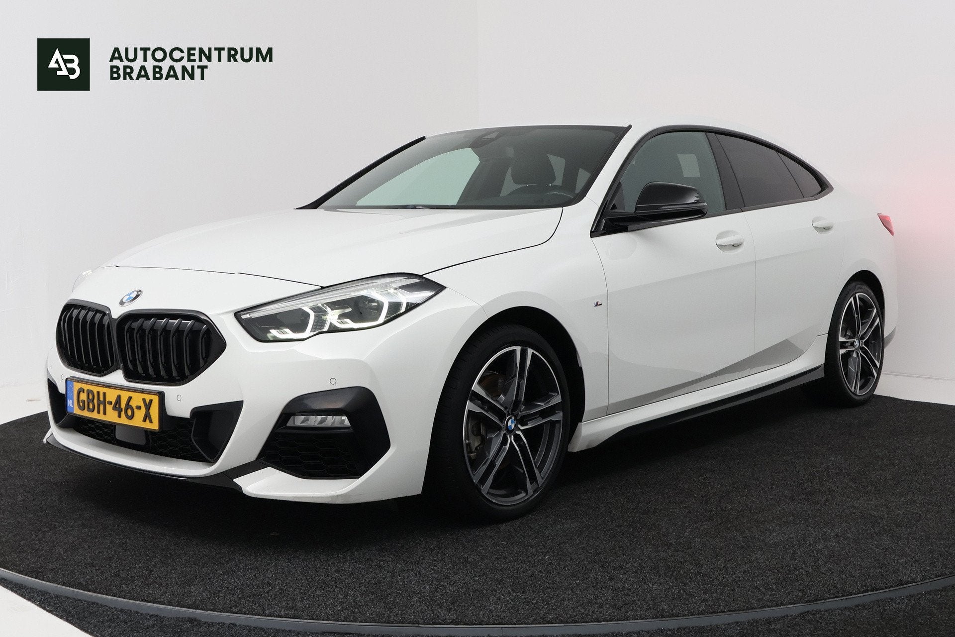 BMW 2-serie Gran Coupé 218i High Executive (CAMERA, STOELVE, 1350 kg, Wit, Leder, Bedrijf