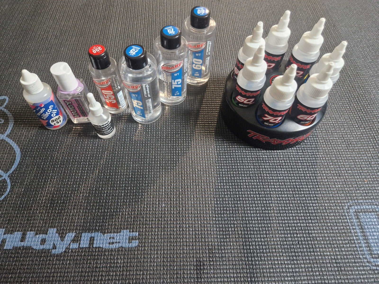 Partij rc shock oil ( schokbreker olie) + draaibare houder, Ophalen of Verzenden