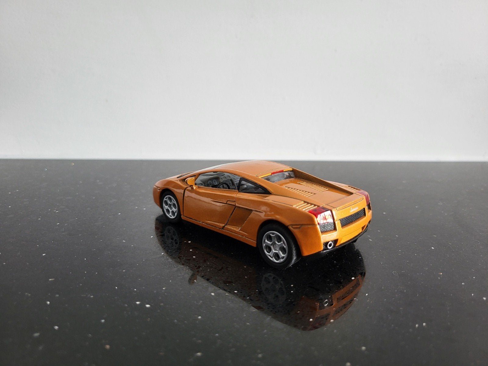 Lamborghini Gallardo oranje 1/43 Bburago, Ophalen of Verzenden, Zo goed als nieuw, Auto, Overige merken