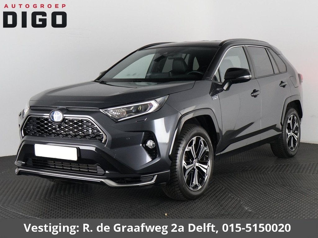 Toyota RAV4 2.5 Plug-in Hybrid AWD Bi-Tone Plus | 1500 KG tr, Auto's, Toyota, Automaat, Gebruikt, 4 cilinders, Bedrijf
