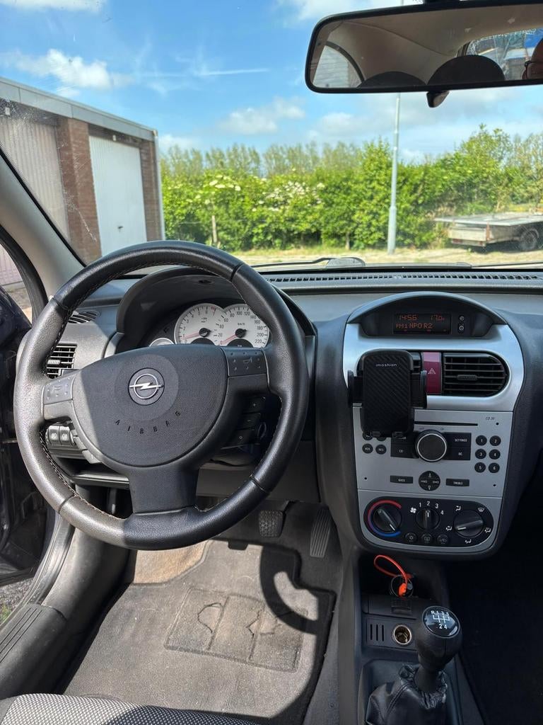 Opel Corsa 1.2 16V Twinport 3D 2006 Grijs, Auto's, Opel, Particulier, Corsa, Benzine, C, Hatchback, Handgeschakeld, Origineel Nederlands