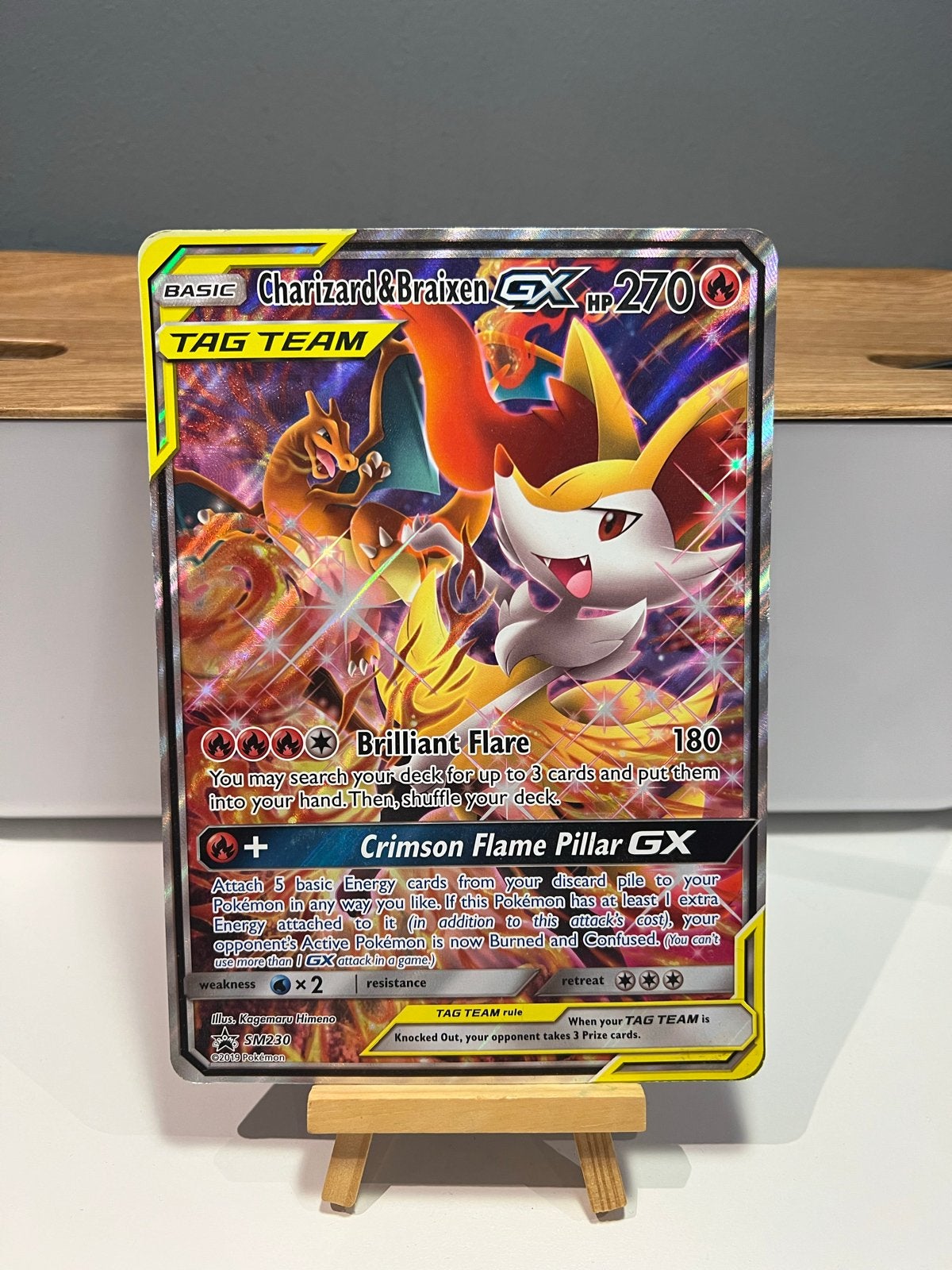 Jumbo Pokémon Charizard & Braixen GX TAG TEAM SM230 Promo, Ophalen of Verzenden, Zo goed als nieuw, Losse kaart