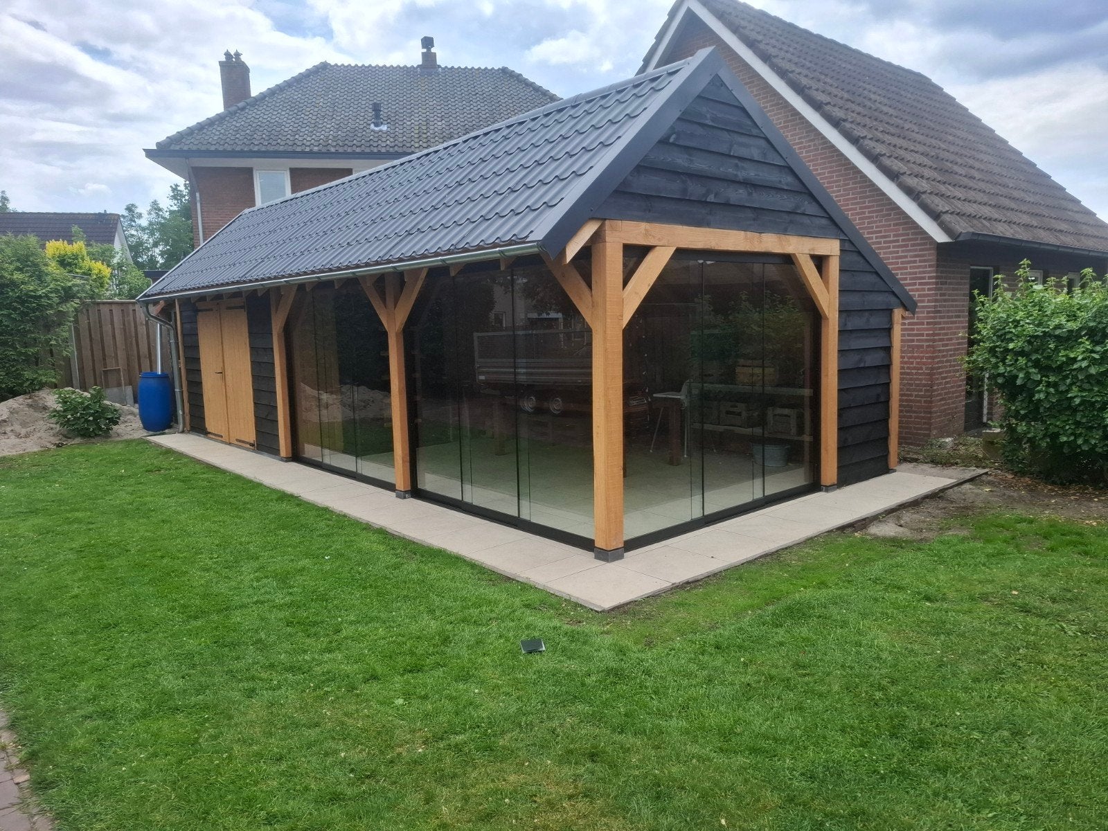 Luxe Tuinhuis met Overkapping en Glazen Schuifwanden, Ophalen, 200 tot 400 cm, Zo goed als nieuw, 500 cm of meer