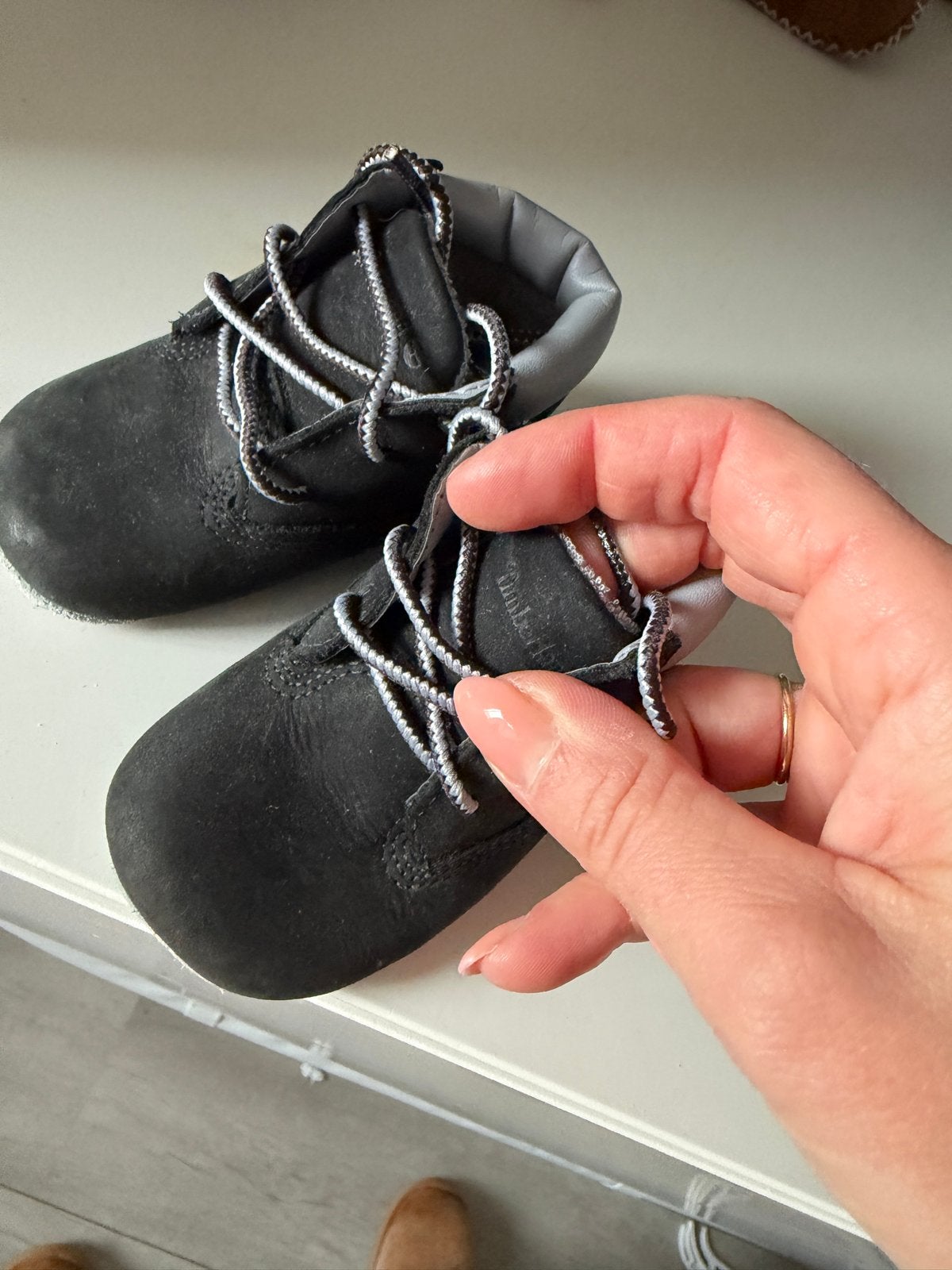 Zwarte Timberland babyschoentjes maat 17, Ophalen of Verzenden, Zo goed als nieuw, Jongetje of Meisje, Schoentjes