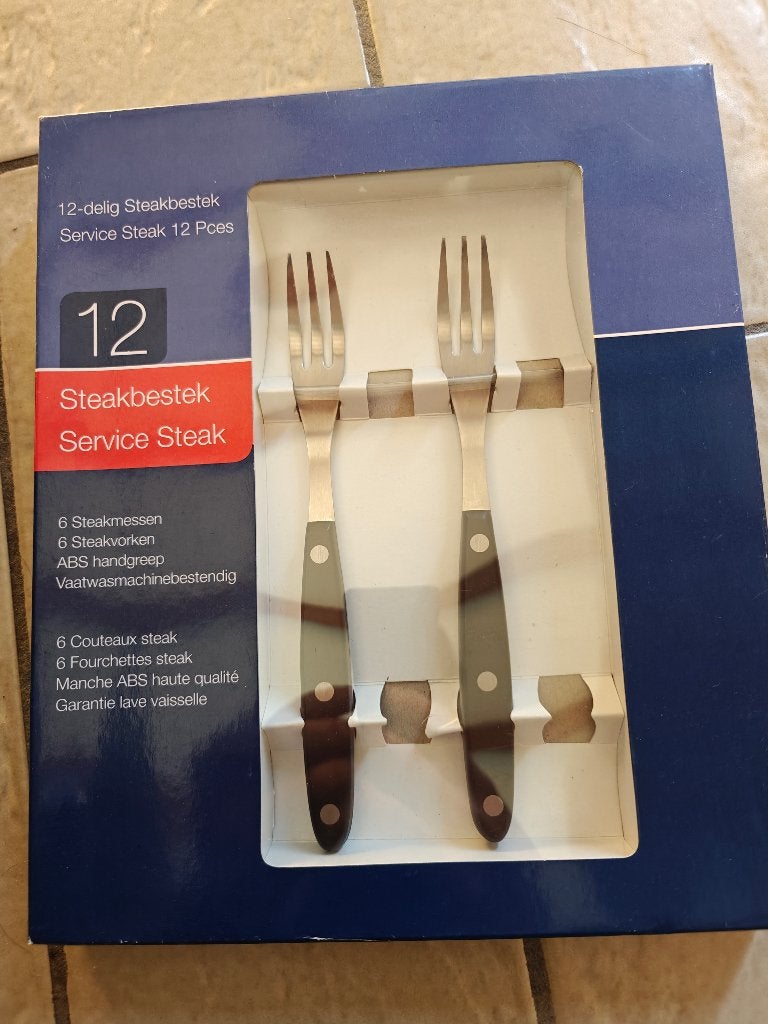 6 steak vorken + mes, Ophalen of Verzenden, Zo goed als nieuw, Rvs of Chroom