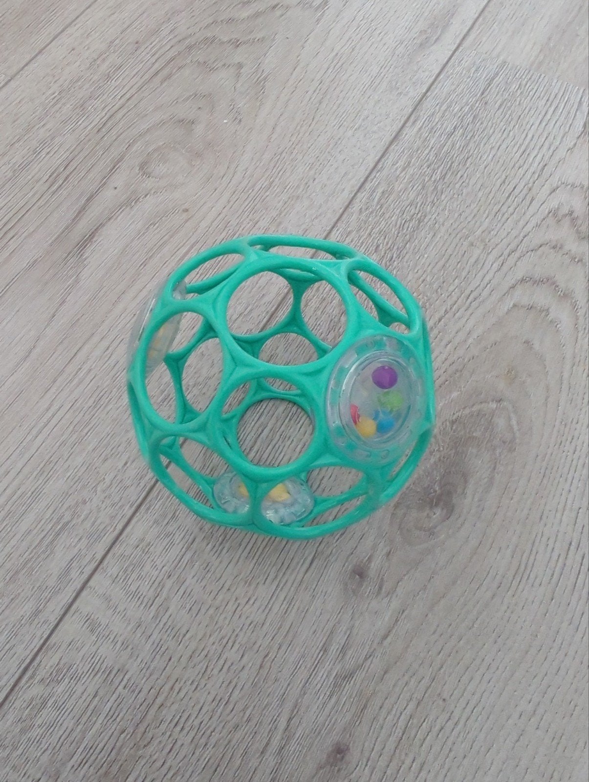 O-ball rammelaar baby - Groen, Ophalen of Verzenden, Zo goed als nieuw, Rammelaar, Met geluid